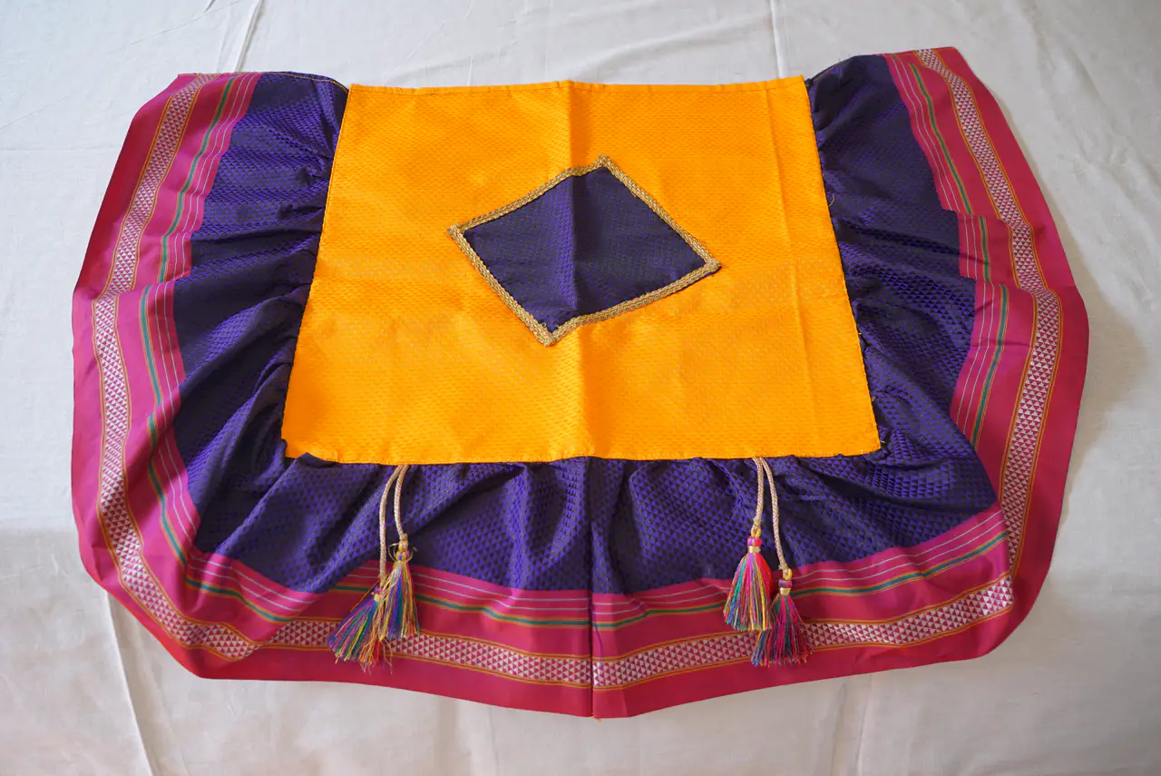 Handcrafted Paithani Violet Yellow Chaurang Aasan — made by Hirakani Foundation artisans, Nashik