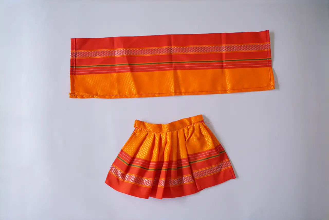 Handcrafted Paithani Orange Devi Vastra — made by Hirakani Foundation artisans, Nashik