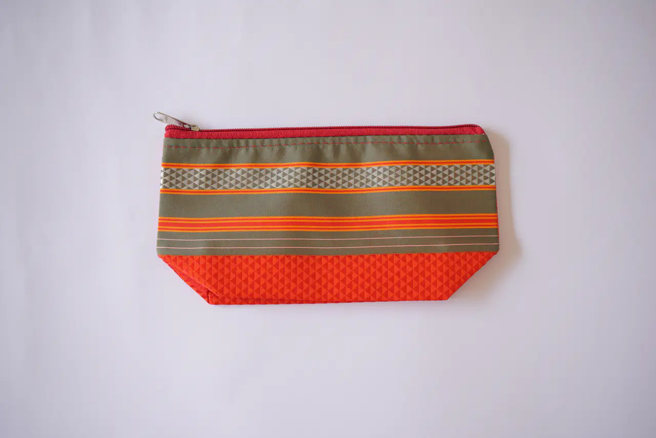 Handcrafted Paithani Orange Pouch — made by Hirakani Foundation artisans, Nashik