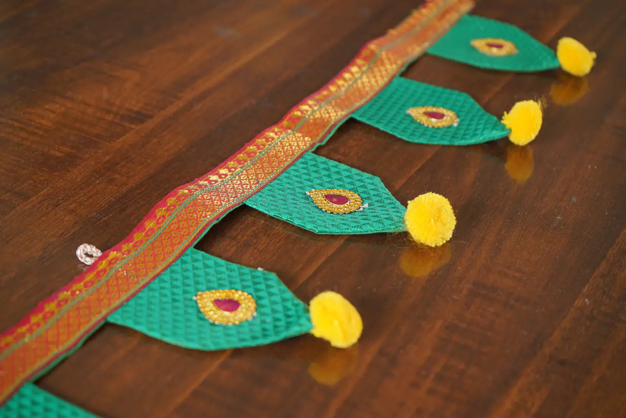 Handcrafted Paithani Green Dev Ghar Toran — made by Hirakani Foundation artisans, Nashik